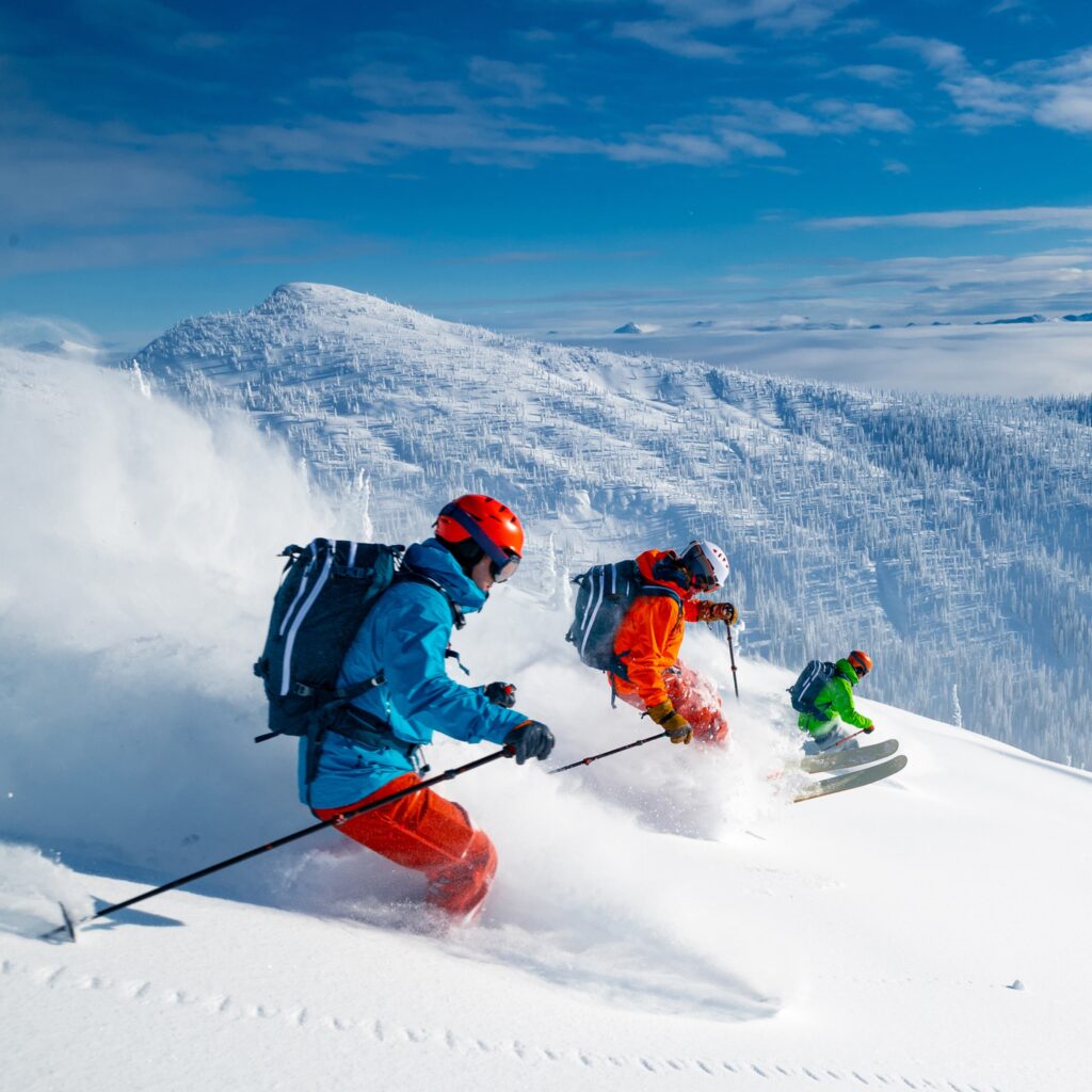 skiiers on a snowy mountain