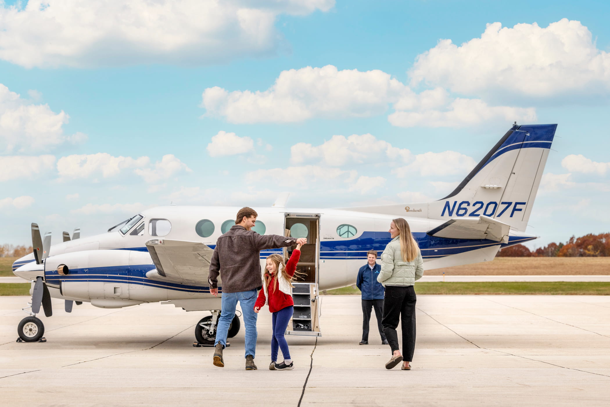 family-entering-beechcraft-king-air