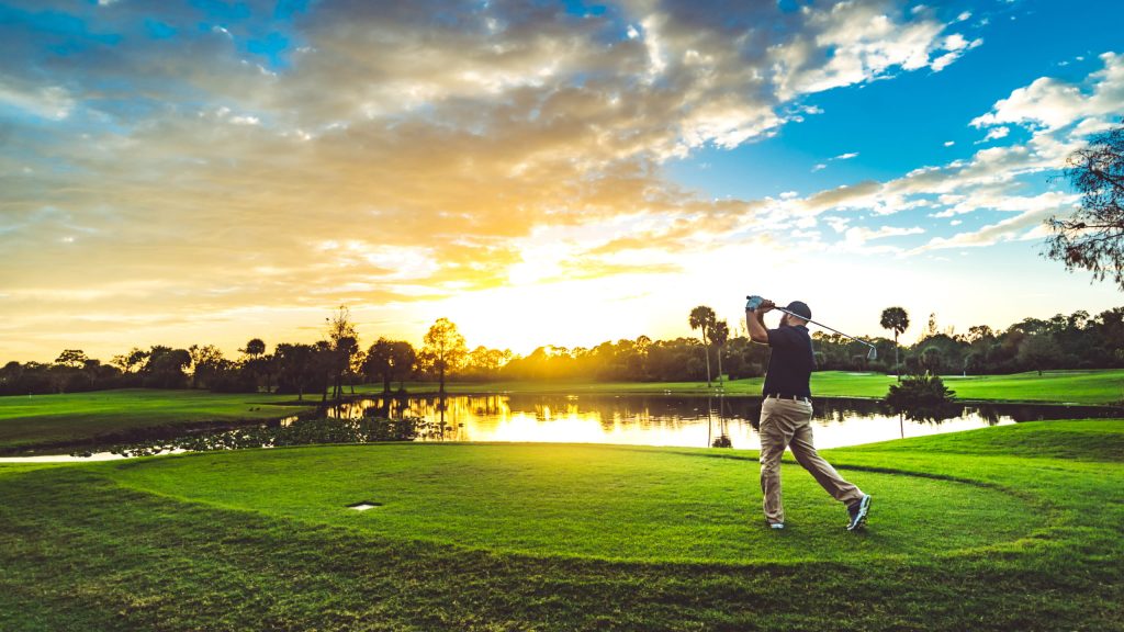 Man golfing on a golf course in south Florida. Okeeheelee golf course in West Palm Beach Florida